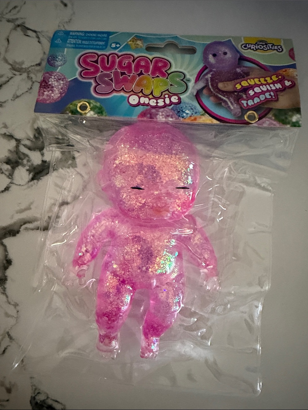 Pink Glitter Squeeze Doll - Sparkle Onesie Toy